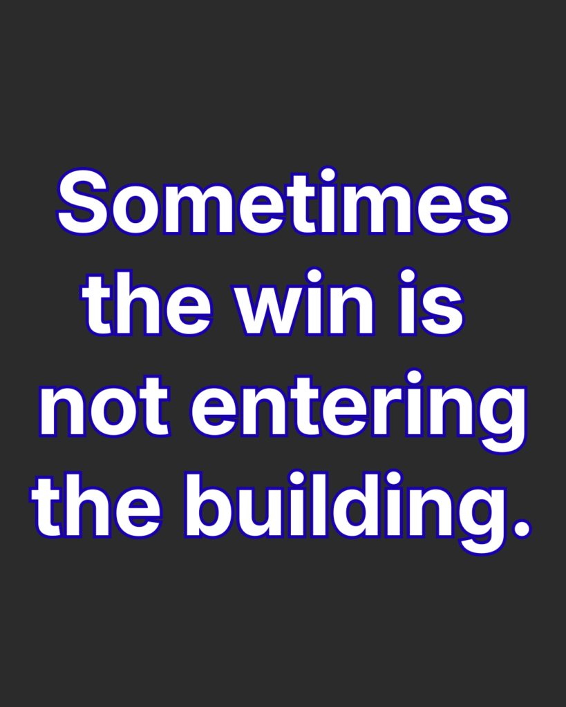 Image displaying text, "Sometimes the win is not entering the building."